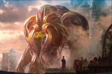 A gear hulk towering over a city